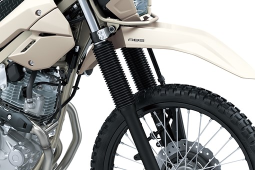 Close-up view of the front end of a motorcycle staged in a white studio background. opens in a new window