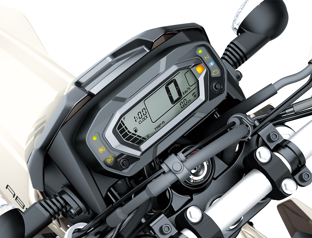 Close-up view of the LCD dash meter of a motorcycle staged in a white studio background.