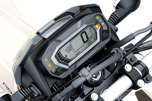 Close-up view of the LCD dash meter of a motorcycle staged in a white studio background. opens in a new window