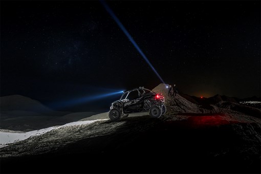 Side angle of a side x side parked off-road. opens in a new window