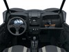 Center POV of the steering wheel and dashboard of a side x side staged in a white studio background.