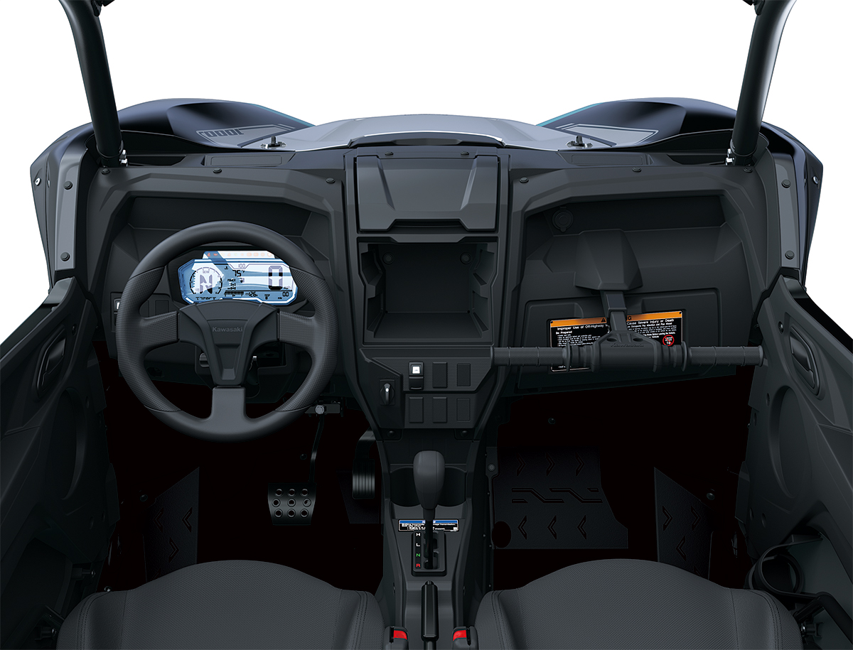 Center view of the steering wheel and dashboard of a side x side staged in a white studio background.