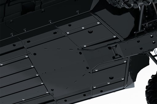 Bottom view of the skid plate of a side x side staged in a white studio background. opens in a new window