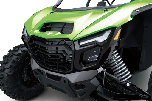 Close-up front three-quarter of the front end of a side x side in a white studio background. opens in a new window