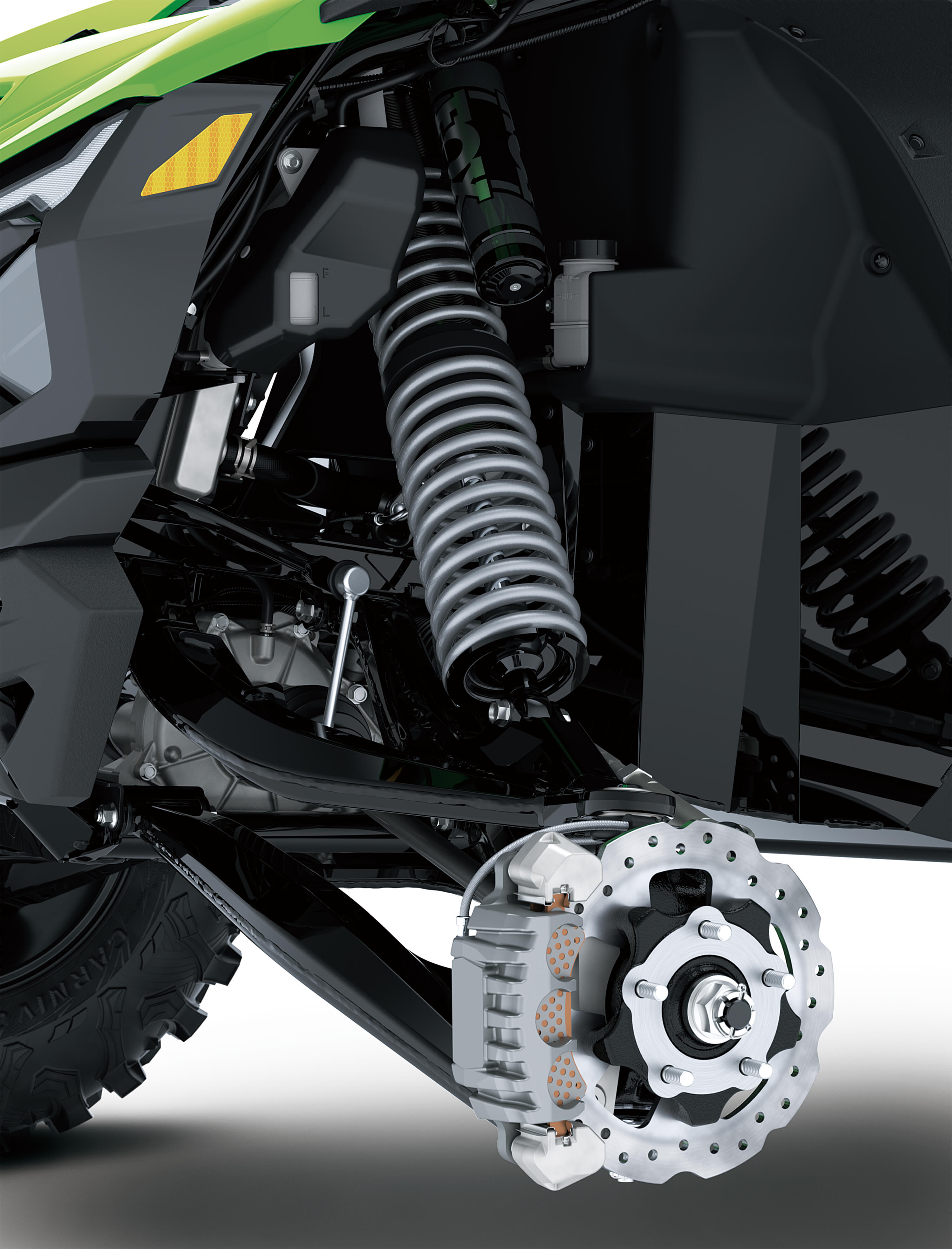 Close-up of suspension of a side x side in a white studio background.