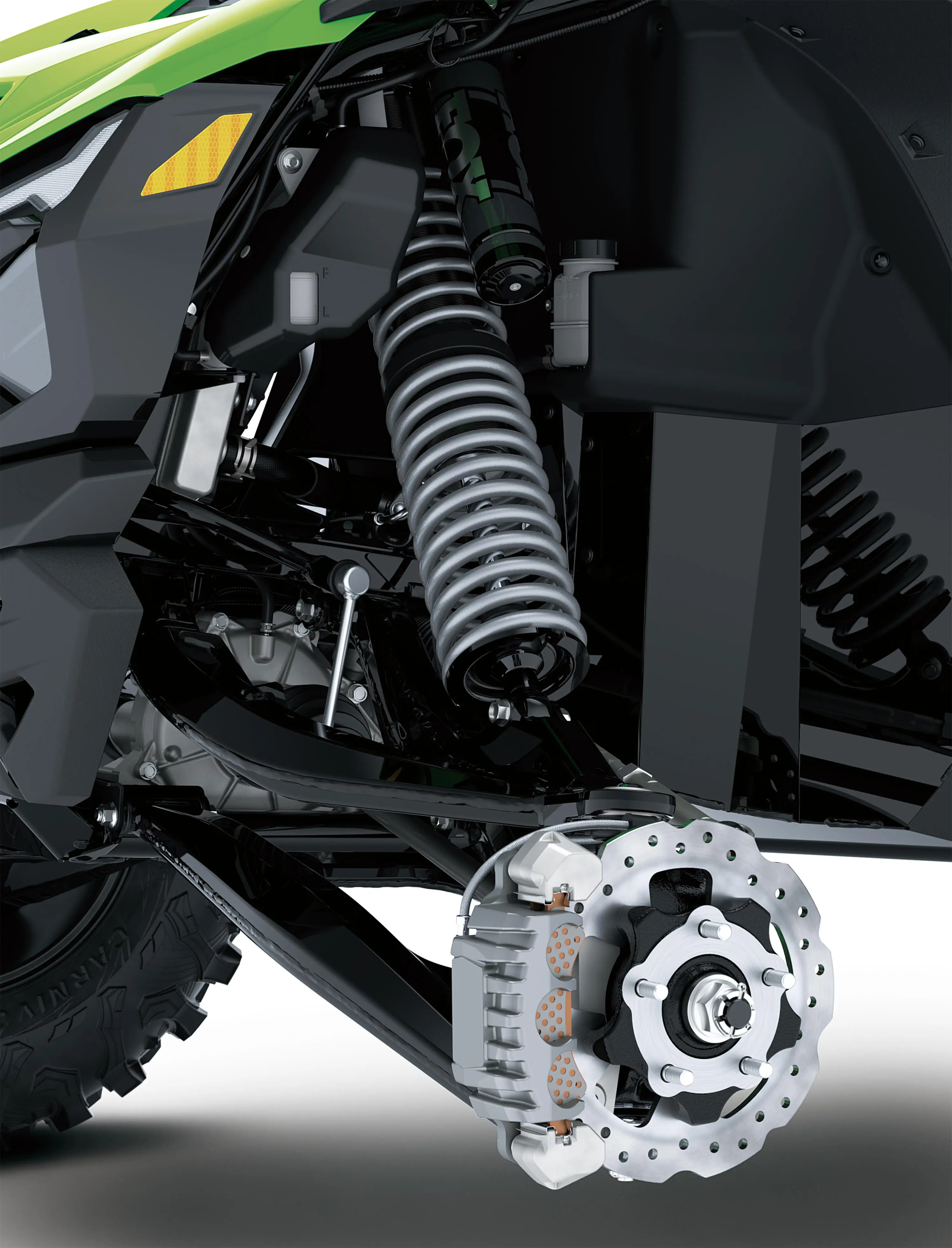 Close-up of suspension of a side x side in a white studio background.