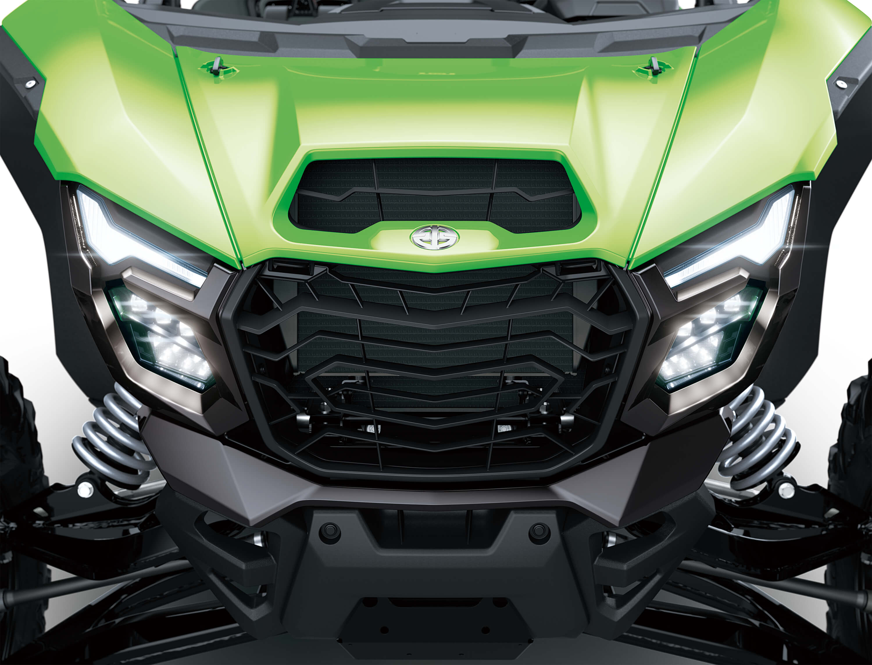 Close-up of the front end of a side x side in a white studio background.