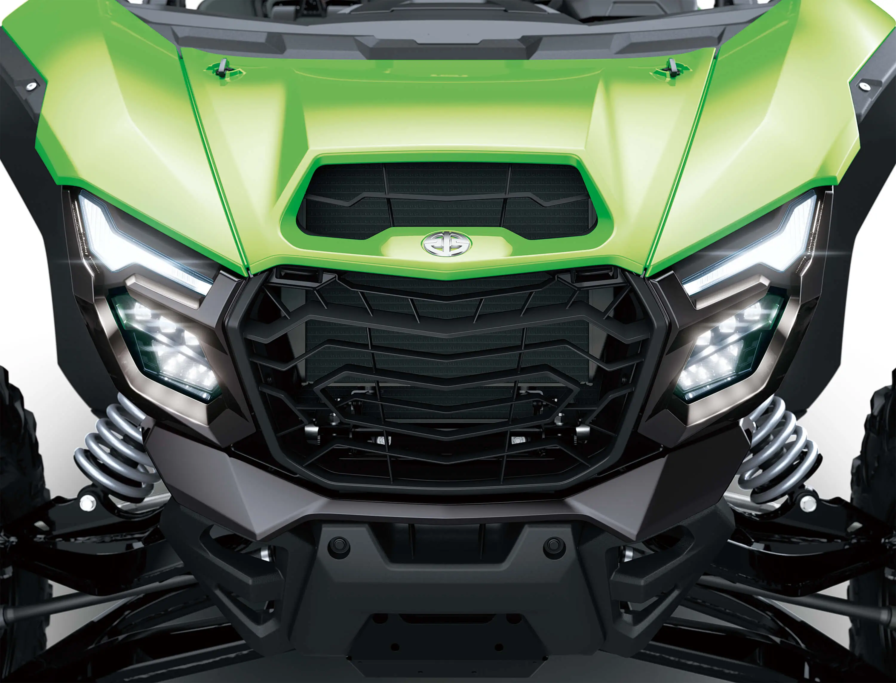 Close-up of the front end of a side x side in a white studio background.