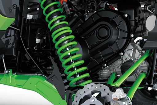 Another close-up of suspension of a side x side in a white studio background. opens in a new window