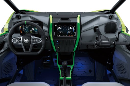 POV angle of the driver compartment inside a side x side in a white studio background. opens in a new window