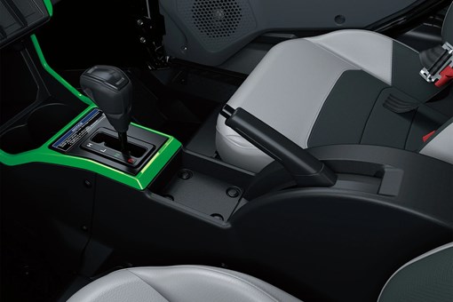Close-up of the gear shift and brake lever of a side x side in a white studio background. opens in a new window