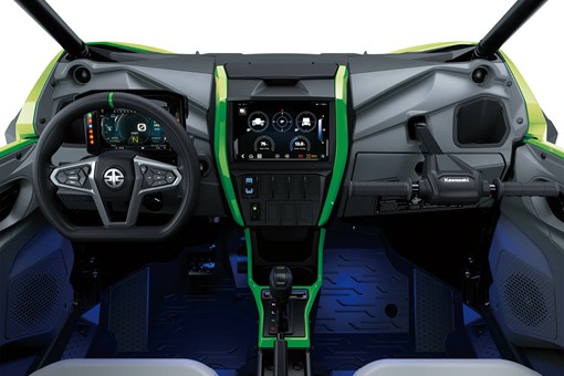 POV angle of the driver compartment inside a side x side in a white studio background. opens in a new window