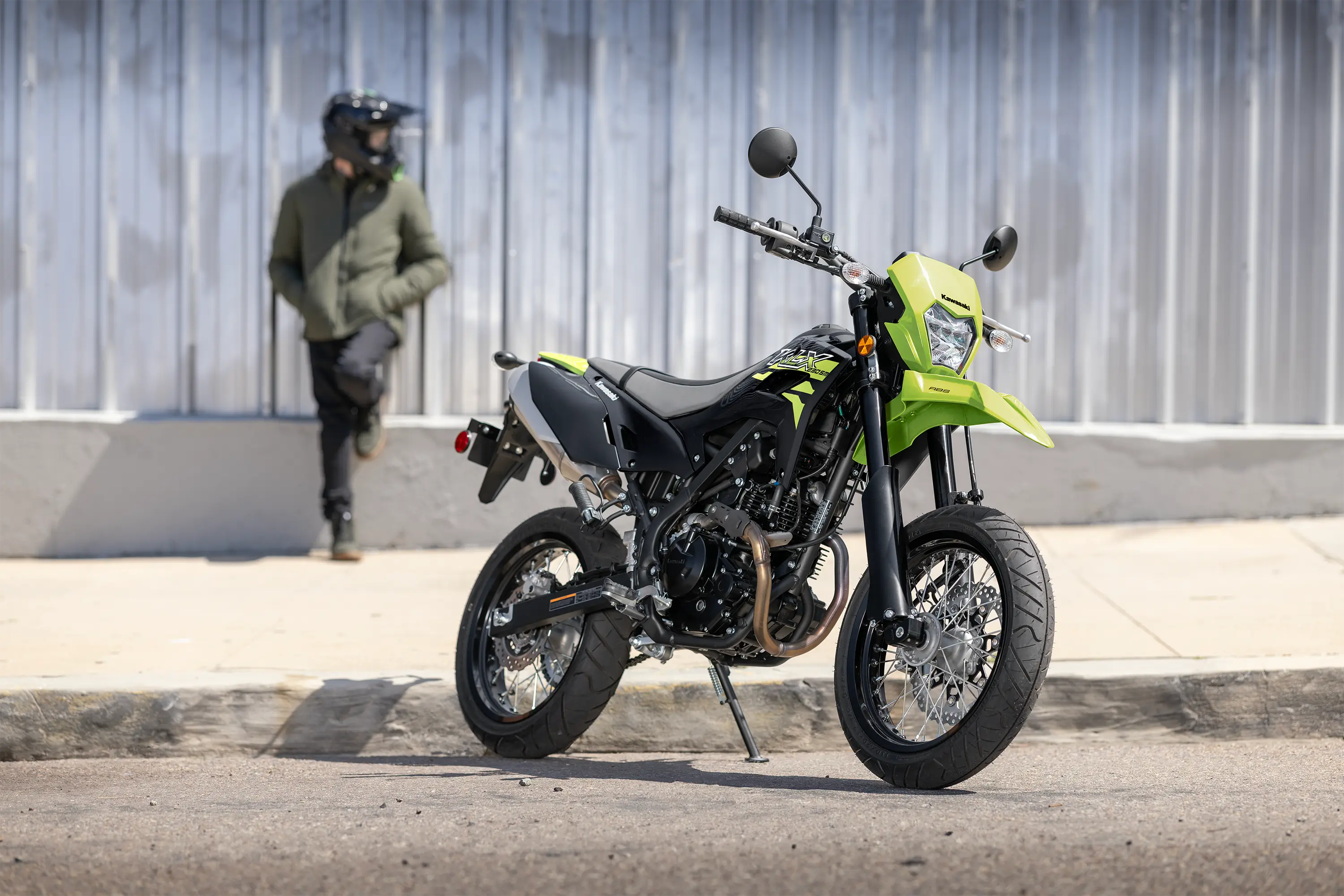 Three-quarter front angle of a motorcycle parked.