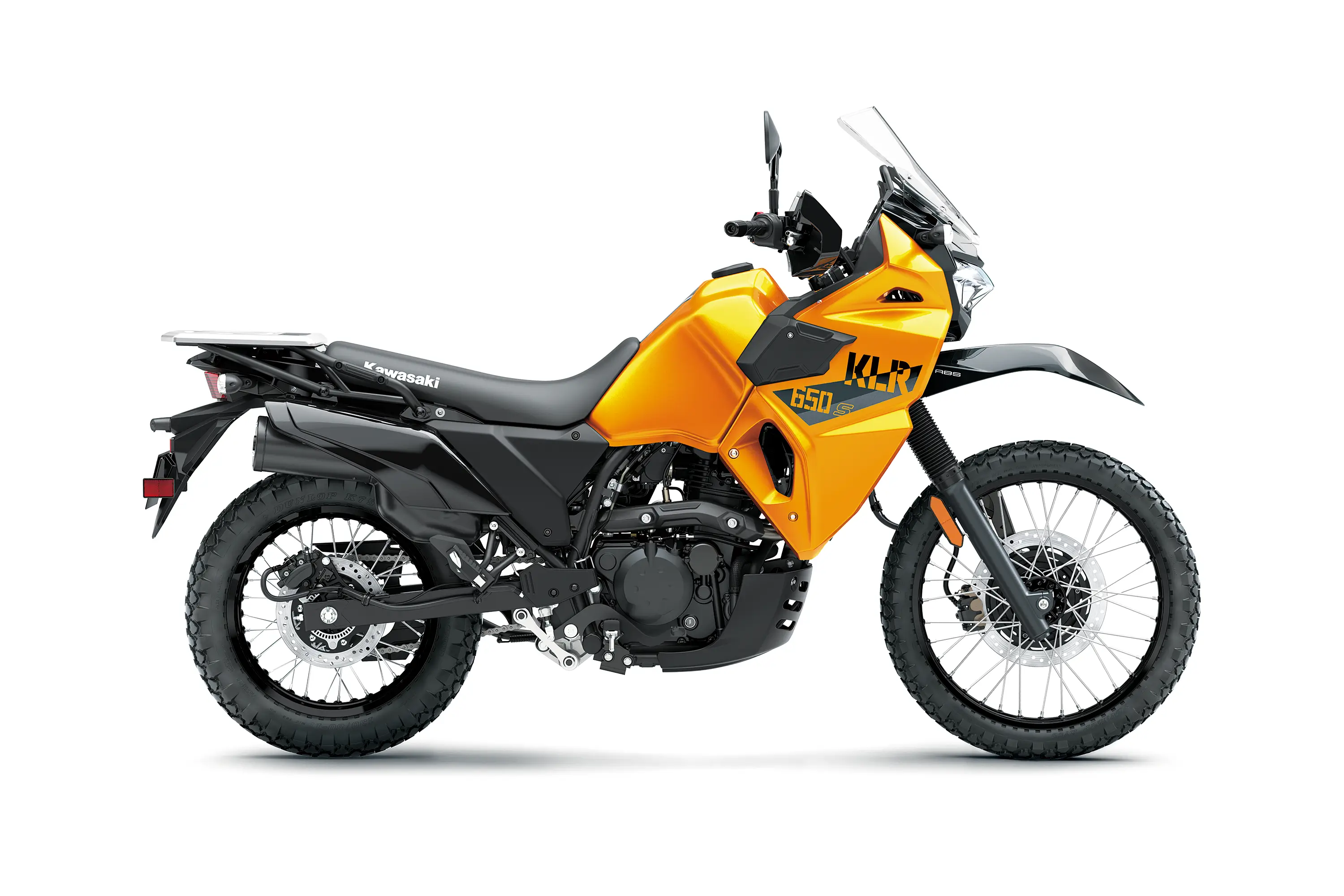 Side angle of an orange motorcycle staged in a white studio background.