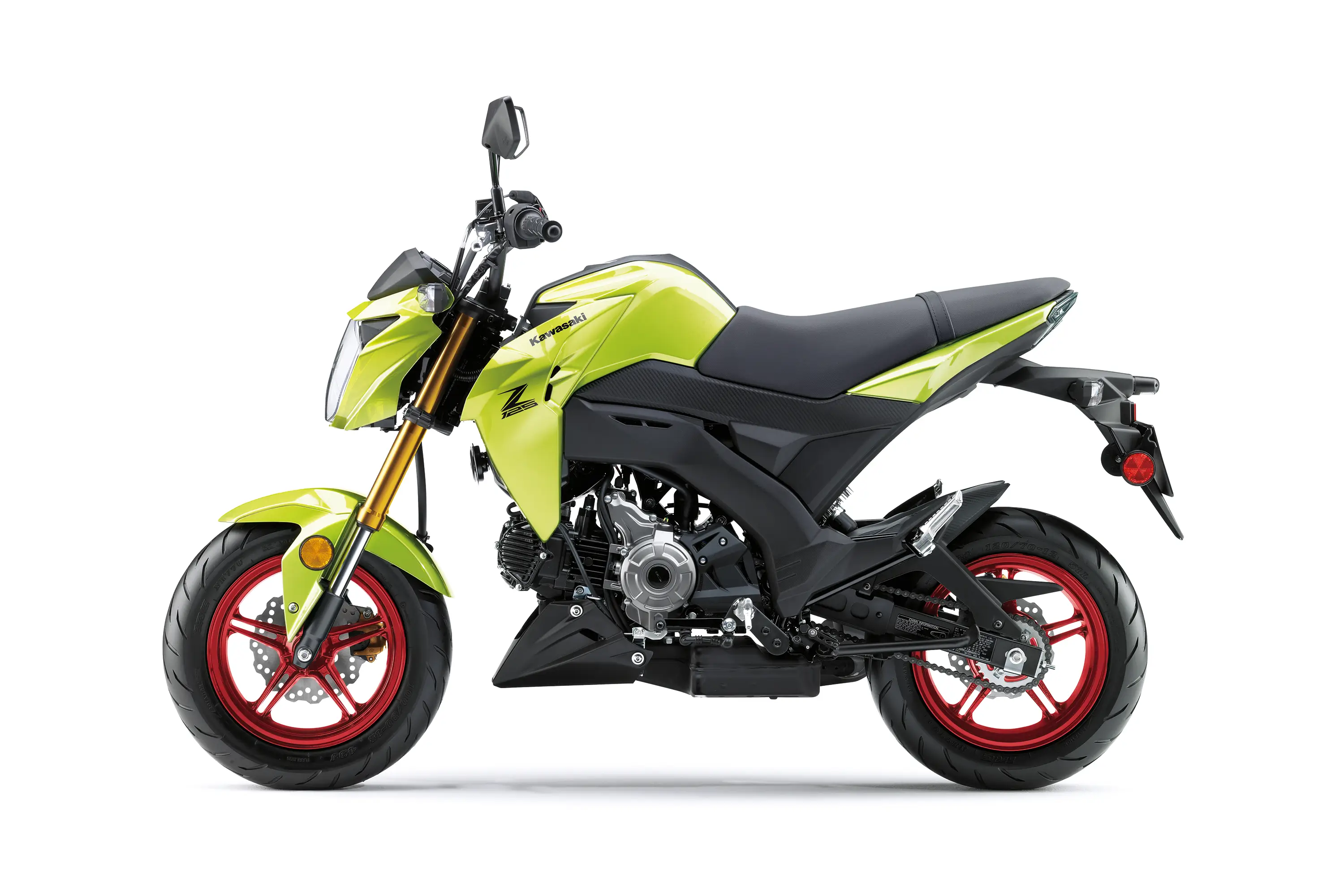 Profile angle of a green motorcycle staged in a white studio background.