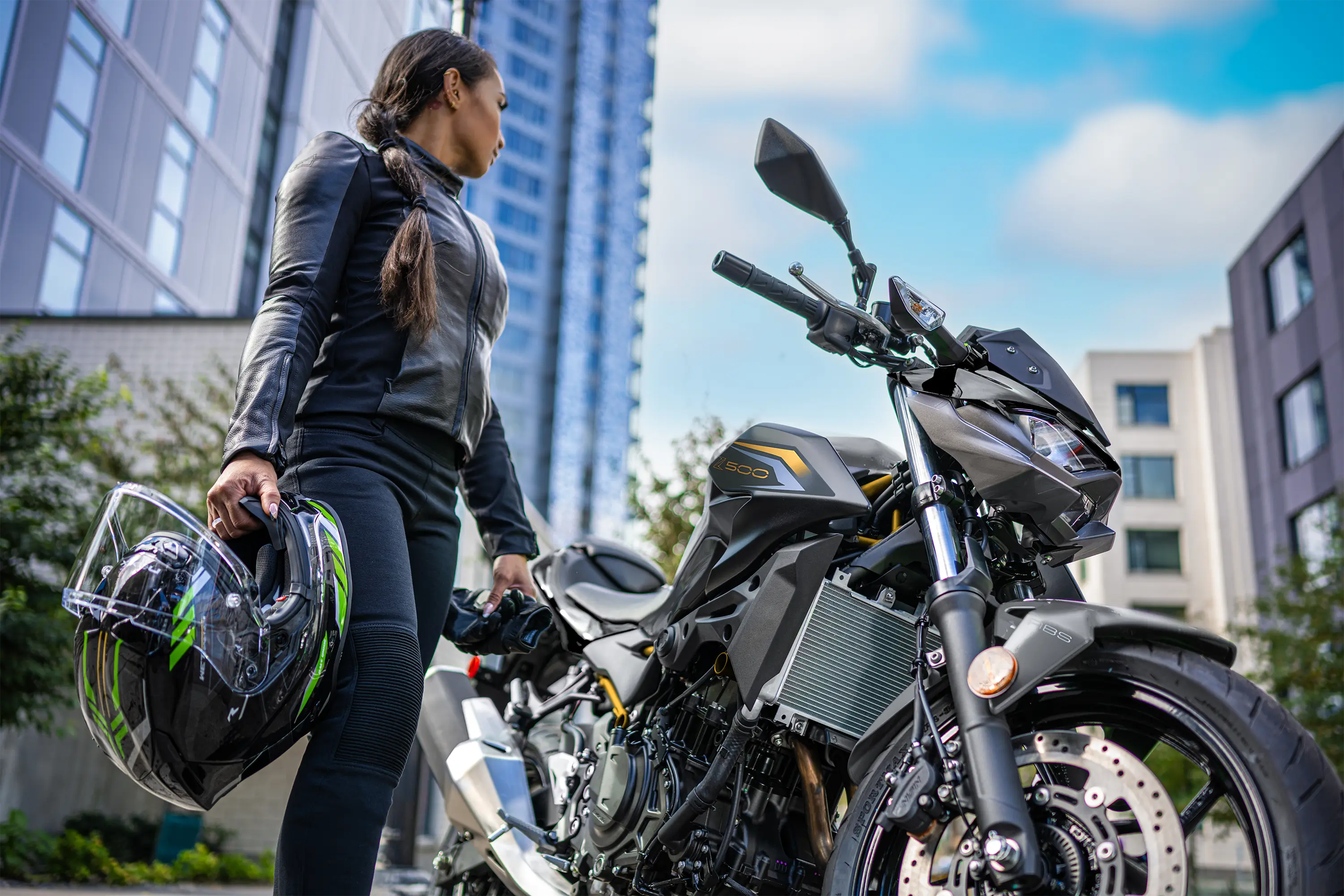 Three-quarter front angle of a motorcycle parked.