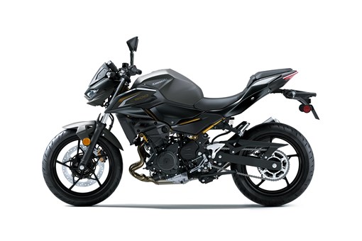 Profile angle of a motorcycle staged in a white studio background. opens in a new window