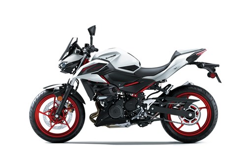 Profile angle of a motorcycle staged in a white studio background. opens in a new window