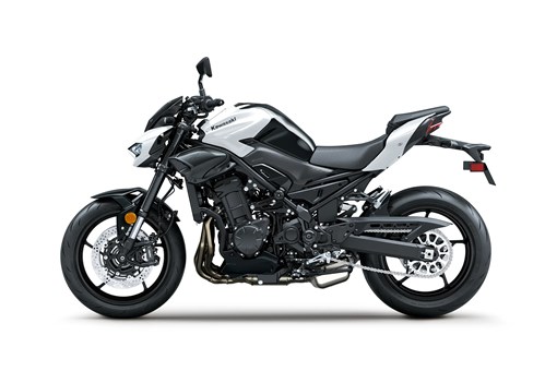 Side angle of a motorcycle with white accents staged in a white studio background. opens in a new window