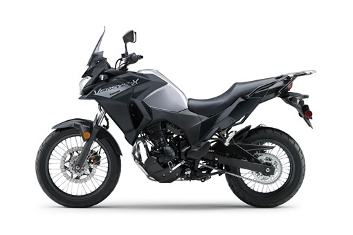 Profile angle of a motorcycle staged in a white studio background. opens in a new window