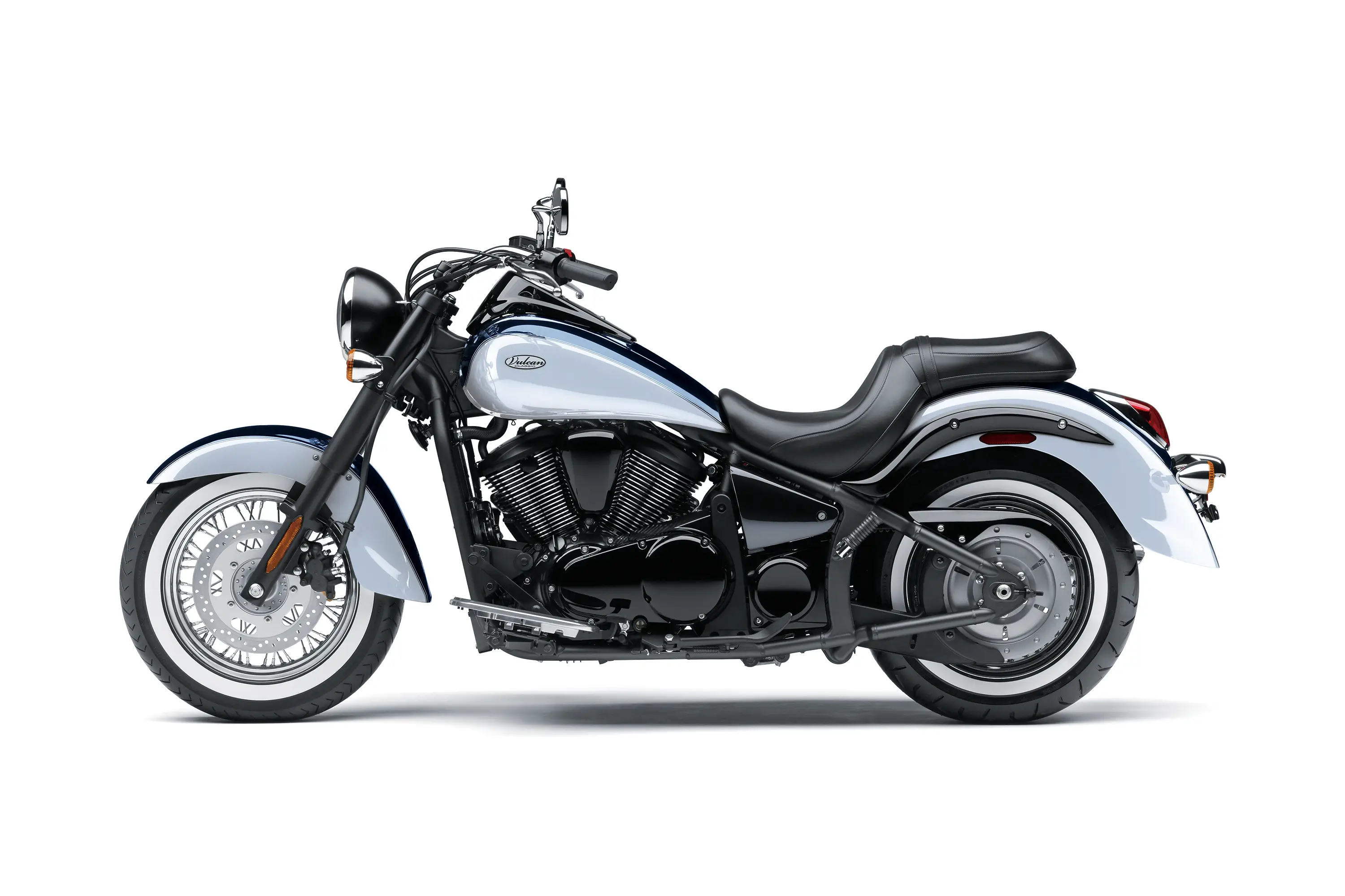 Profile angle of a motorcycle staged in a white studio background.