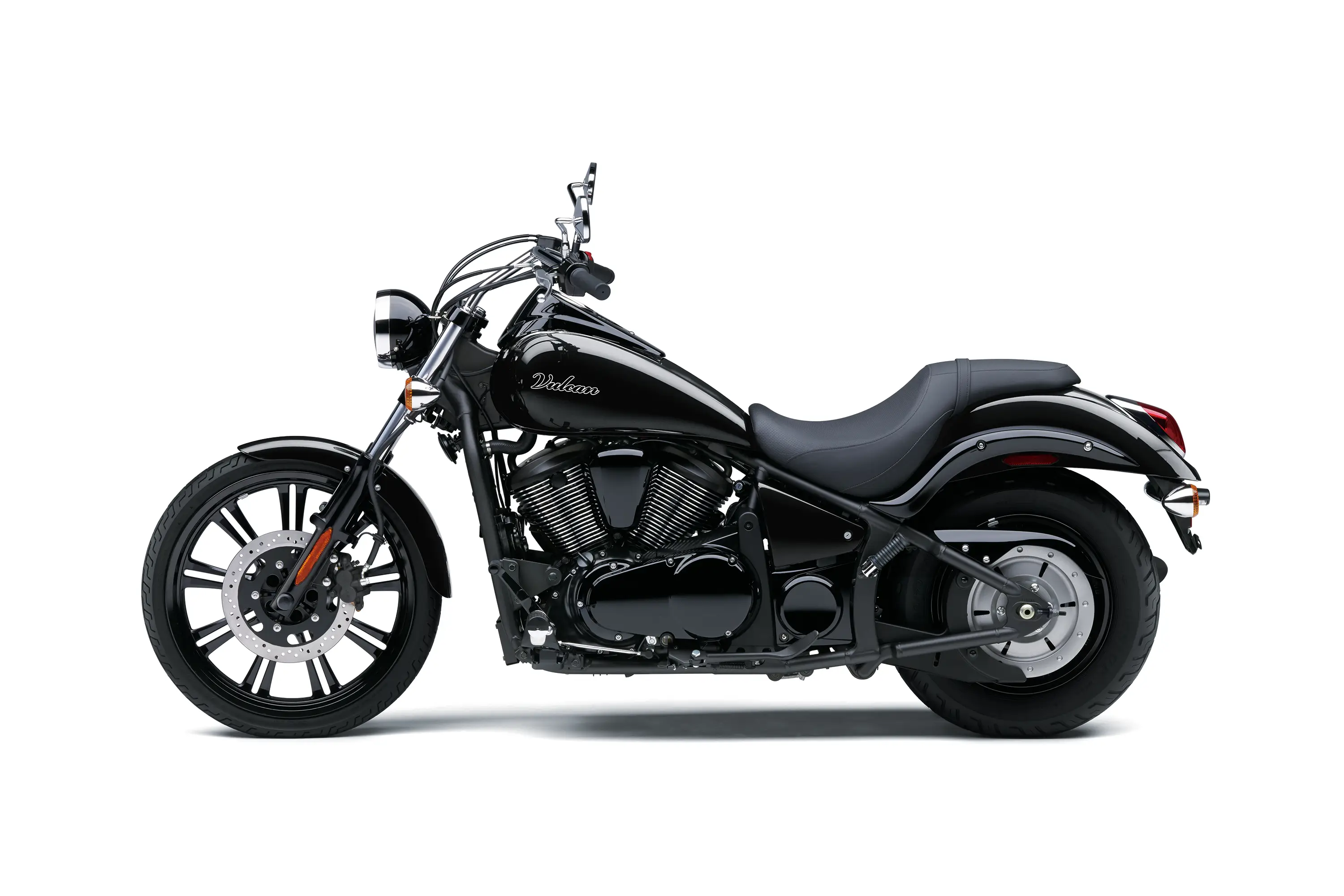 Profile angle of a motorcycle staged in a white studio background.