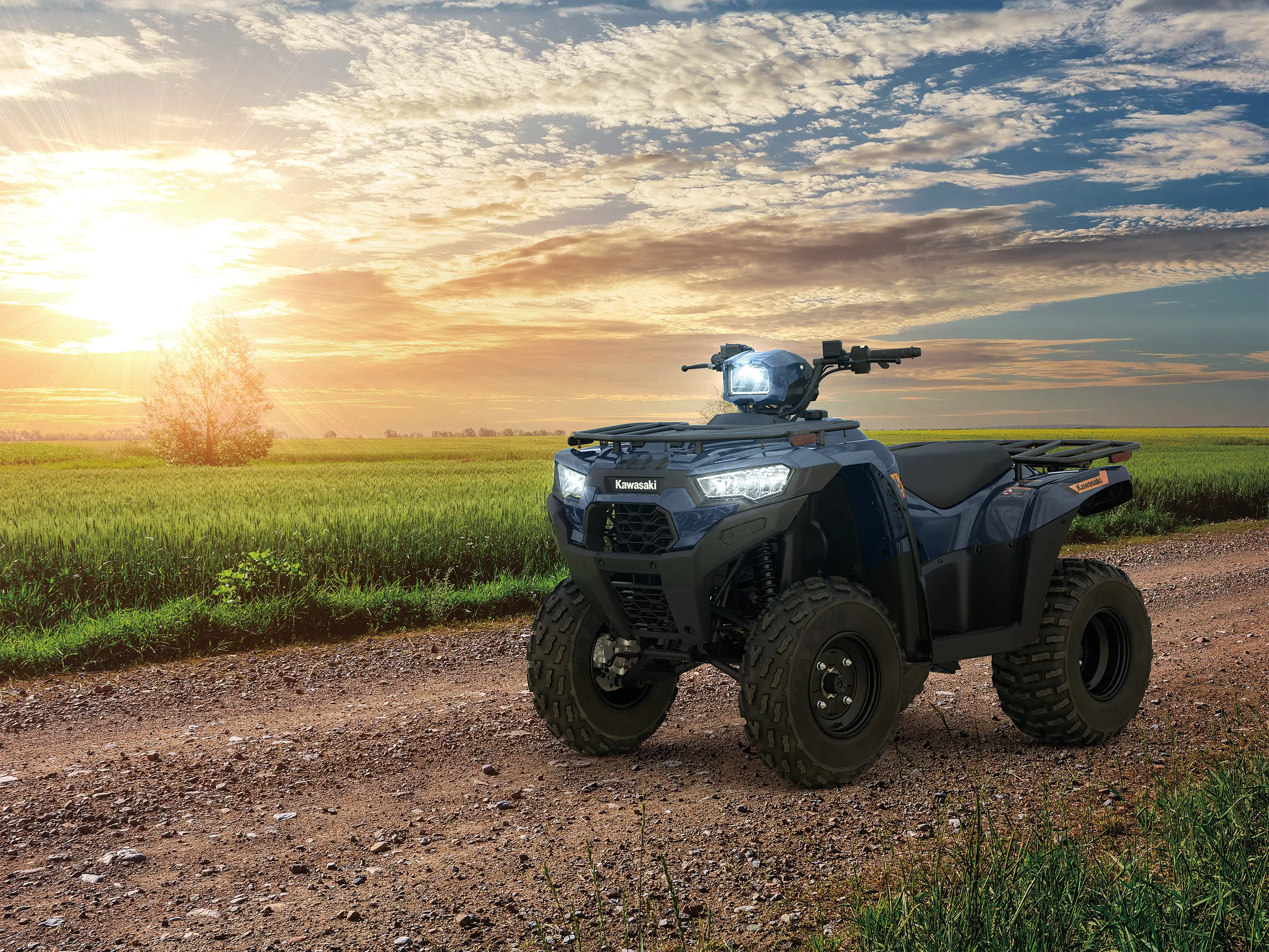 Side angle of an ATV parked off-road.