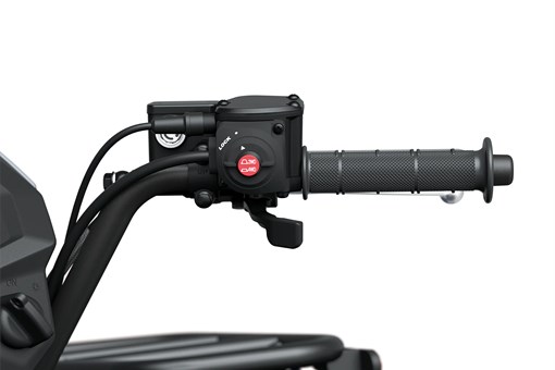 Closeup angle of handlebar of an ATV staged in a white studio background. opens in a new window