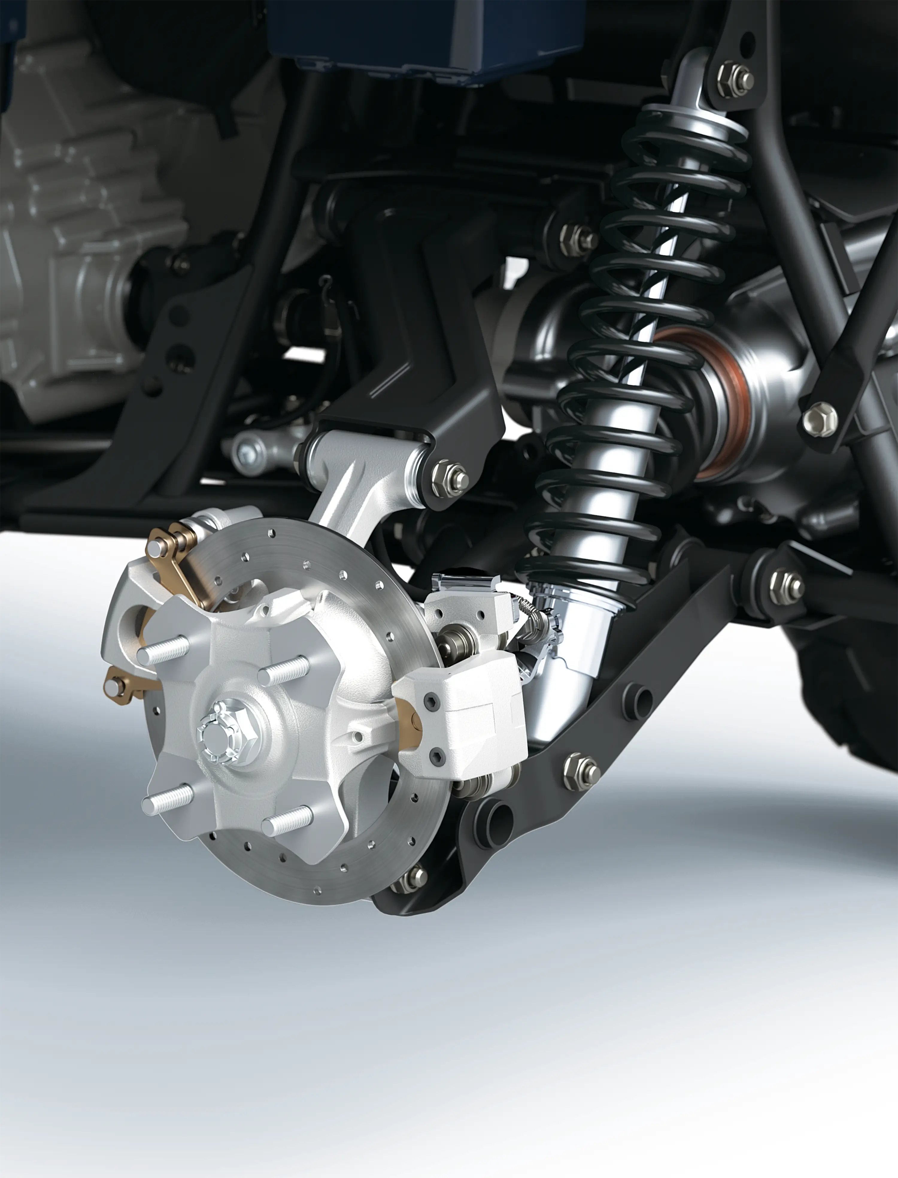 Closeup detail of brakes on an ATV staged in a white studio background.