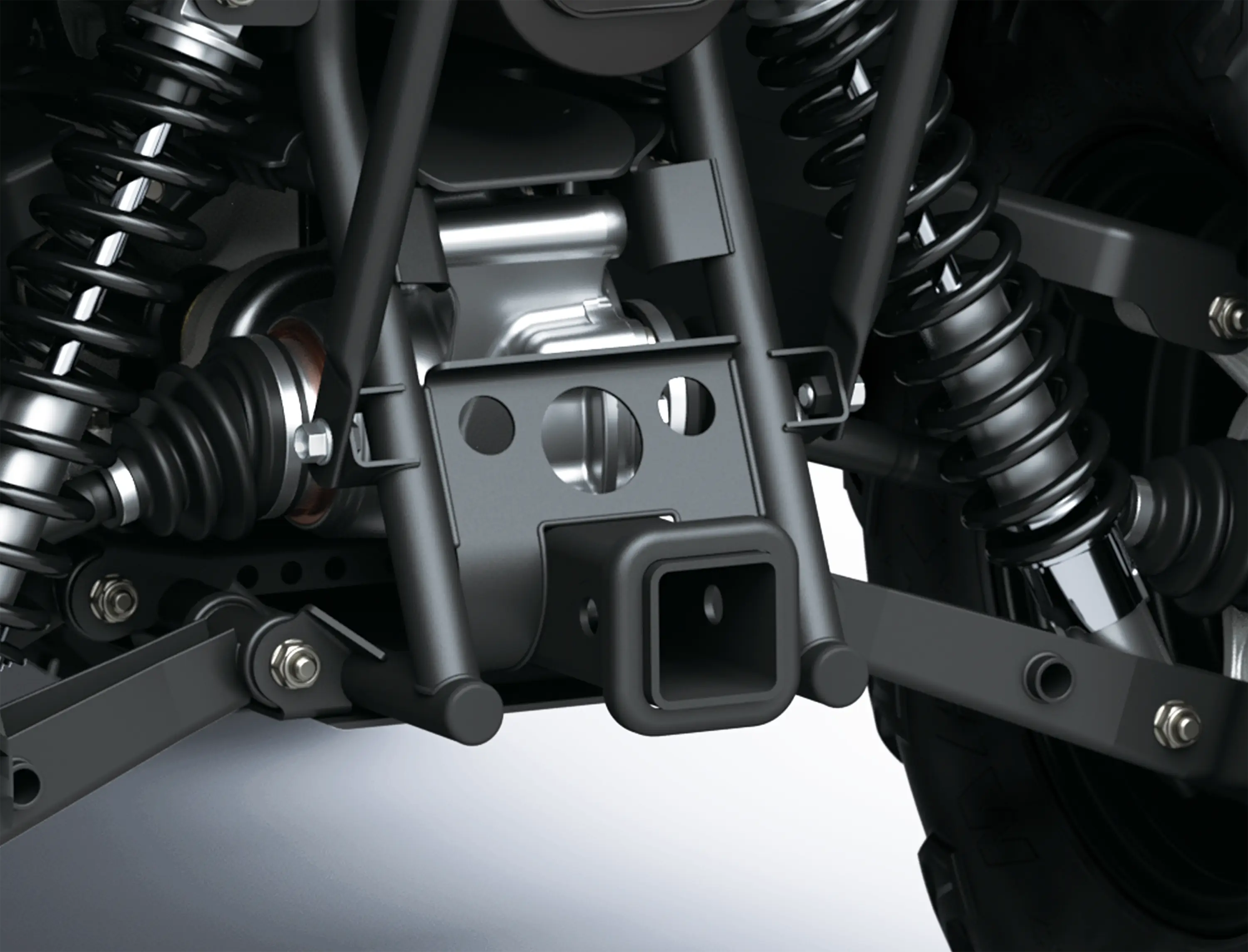 Closeup detail of rear of an ATV staged in a white studio background.