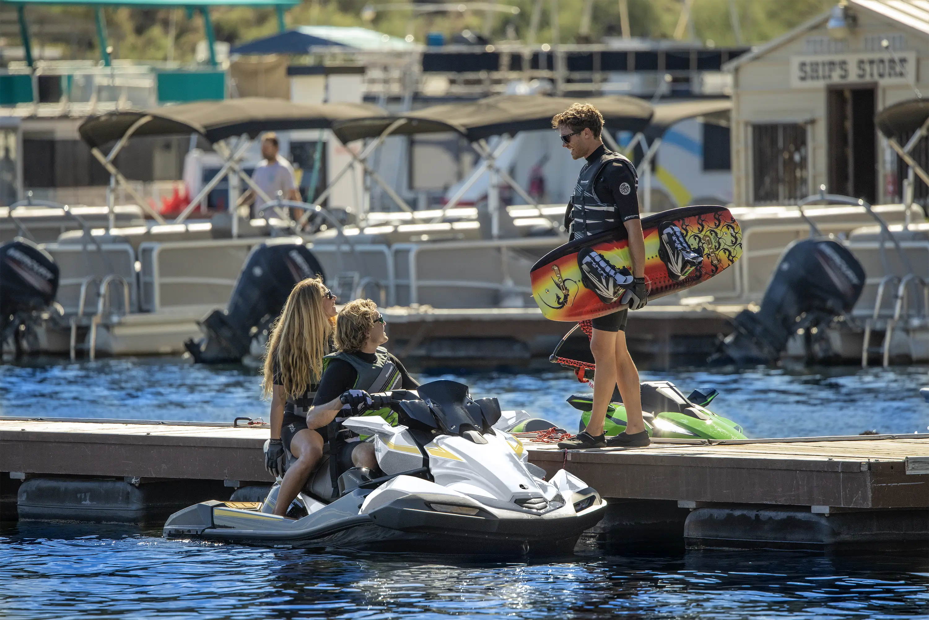 Front angle of a personal watercraft parked on the water.