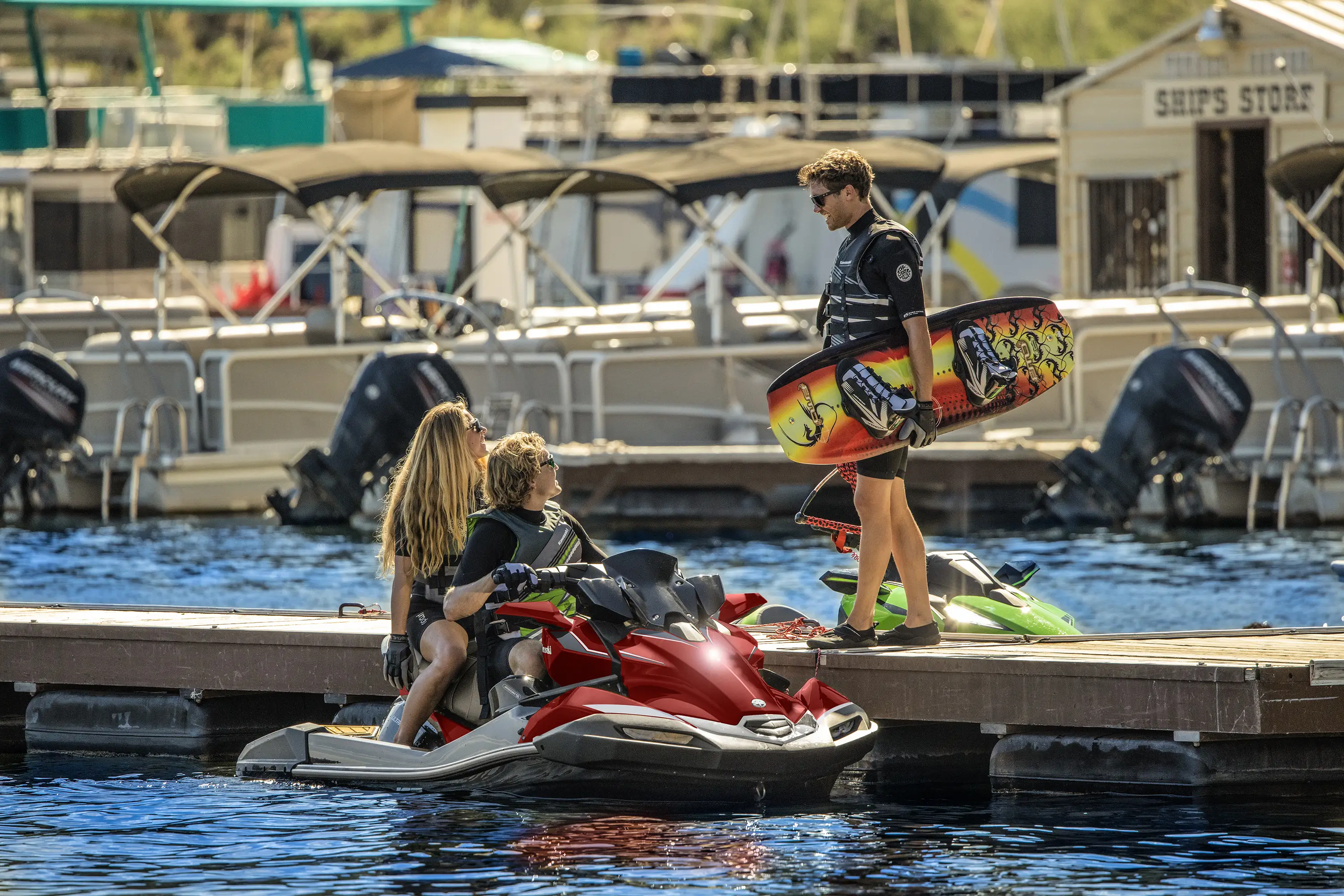 Three-quarter front angle of a personal watercraft parked on the water.