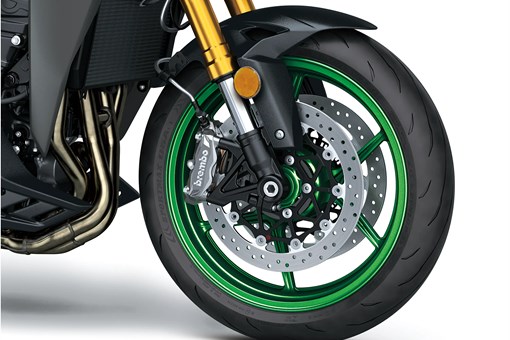 Closeup of motorcycle wheel. opens in a new window