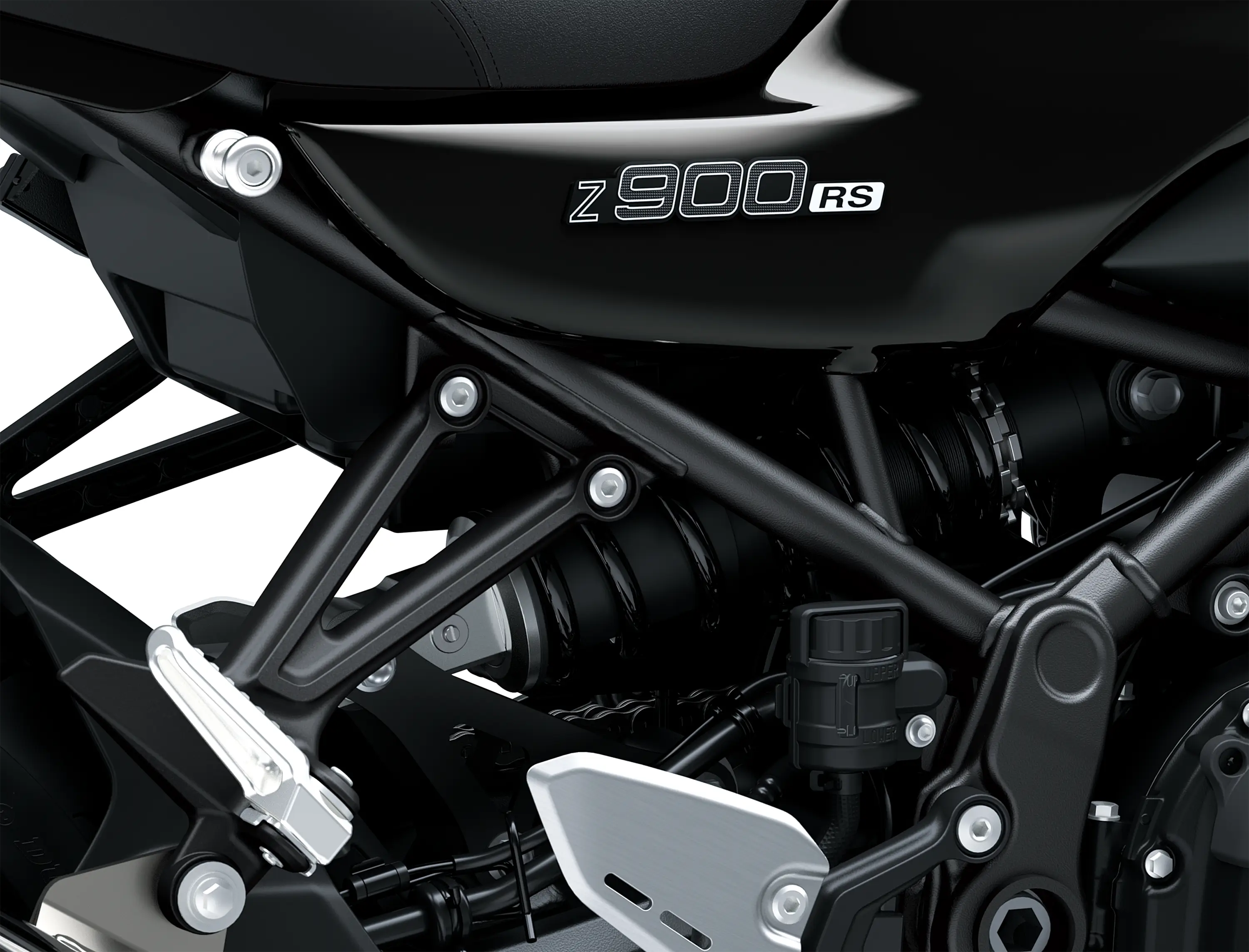 Close-up of the framing of a motorcycle staged in a white studio background.