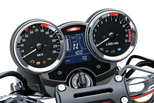 Close-up of the analog-style gauge of a motorcycle staged in a white studio background. opens in a new window