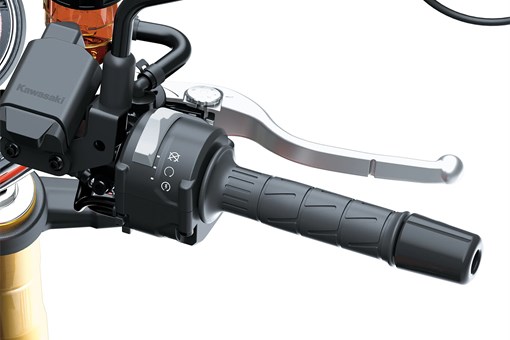 Close-up of the handlebar of a motorcycle staged in a white studio background. opens in a new window