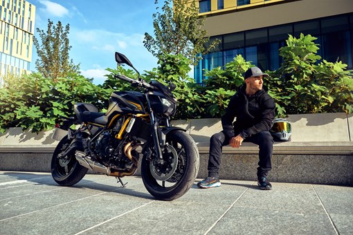 Three-quarter front angle of a motorcycle parked. opens in a new window