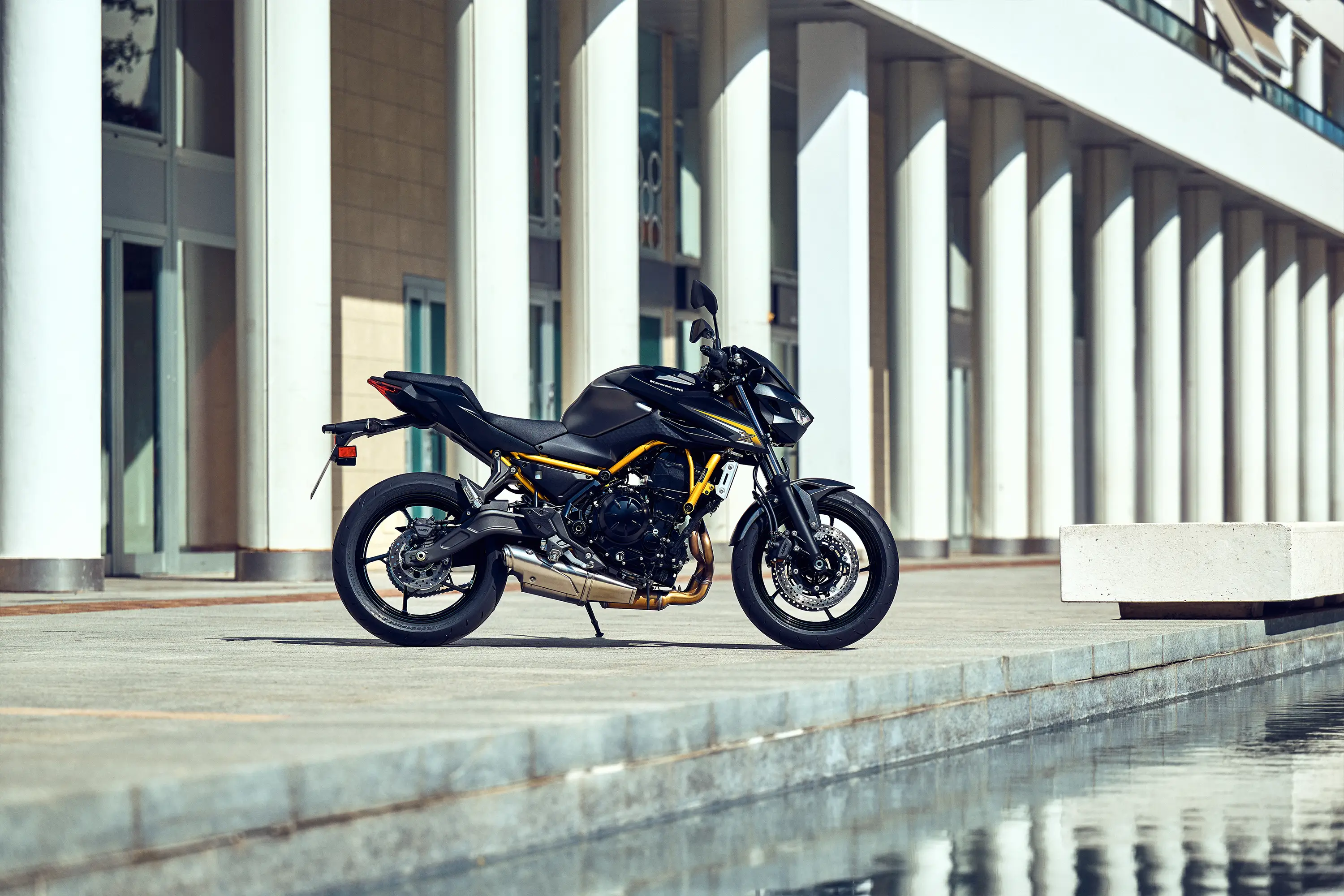 Side angle of a motorcycle parked.