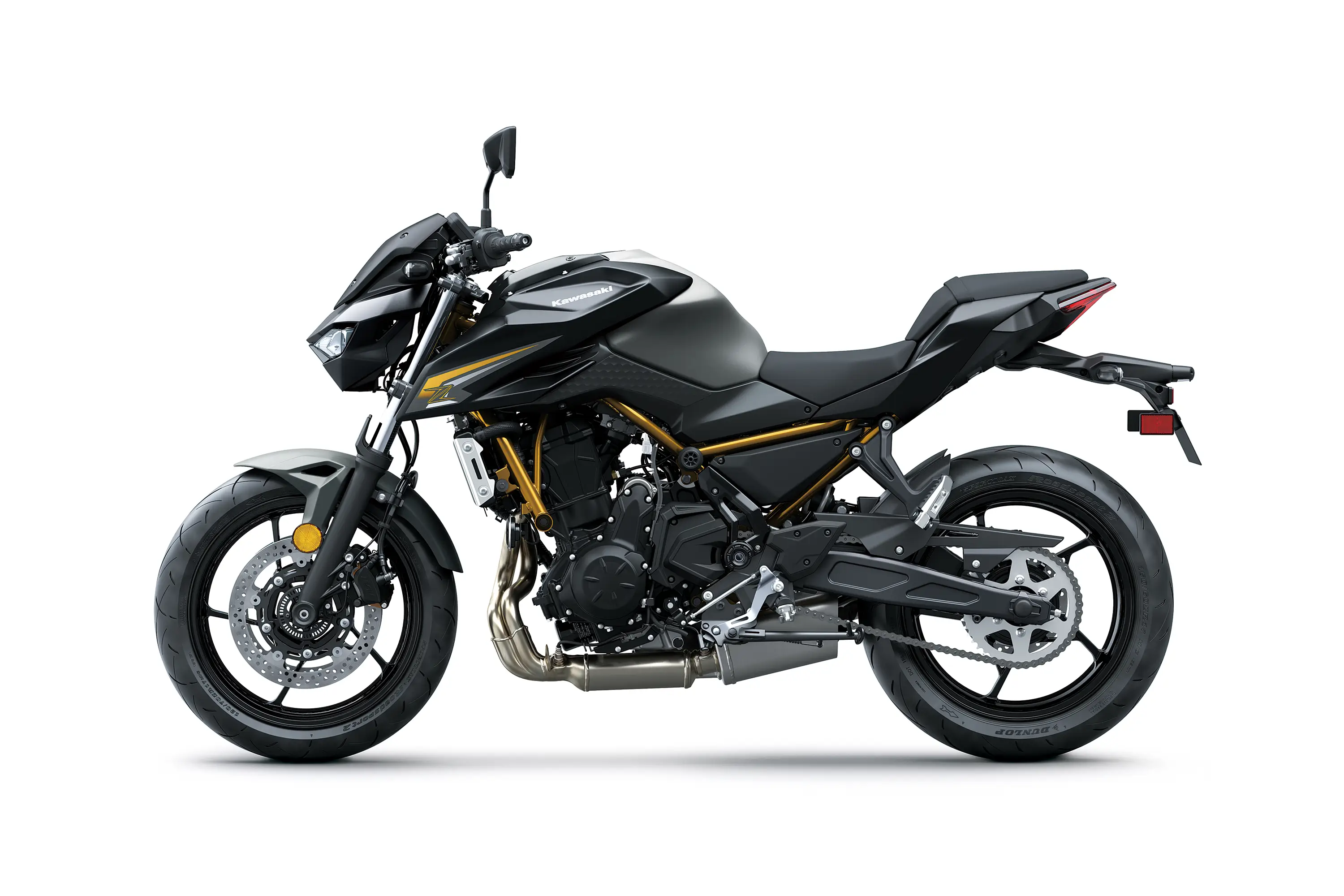 Profile angle of a motorcycle staged in a white studio background.