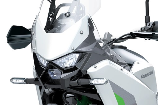 Front close angle of a motorcycle staged in a white studio background. opens in a new window
