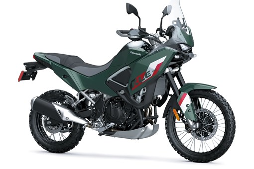 Three-quarter front angle of a gray/green motorcycle staged in a white studio background. opens in a new window