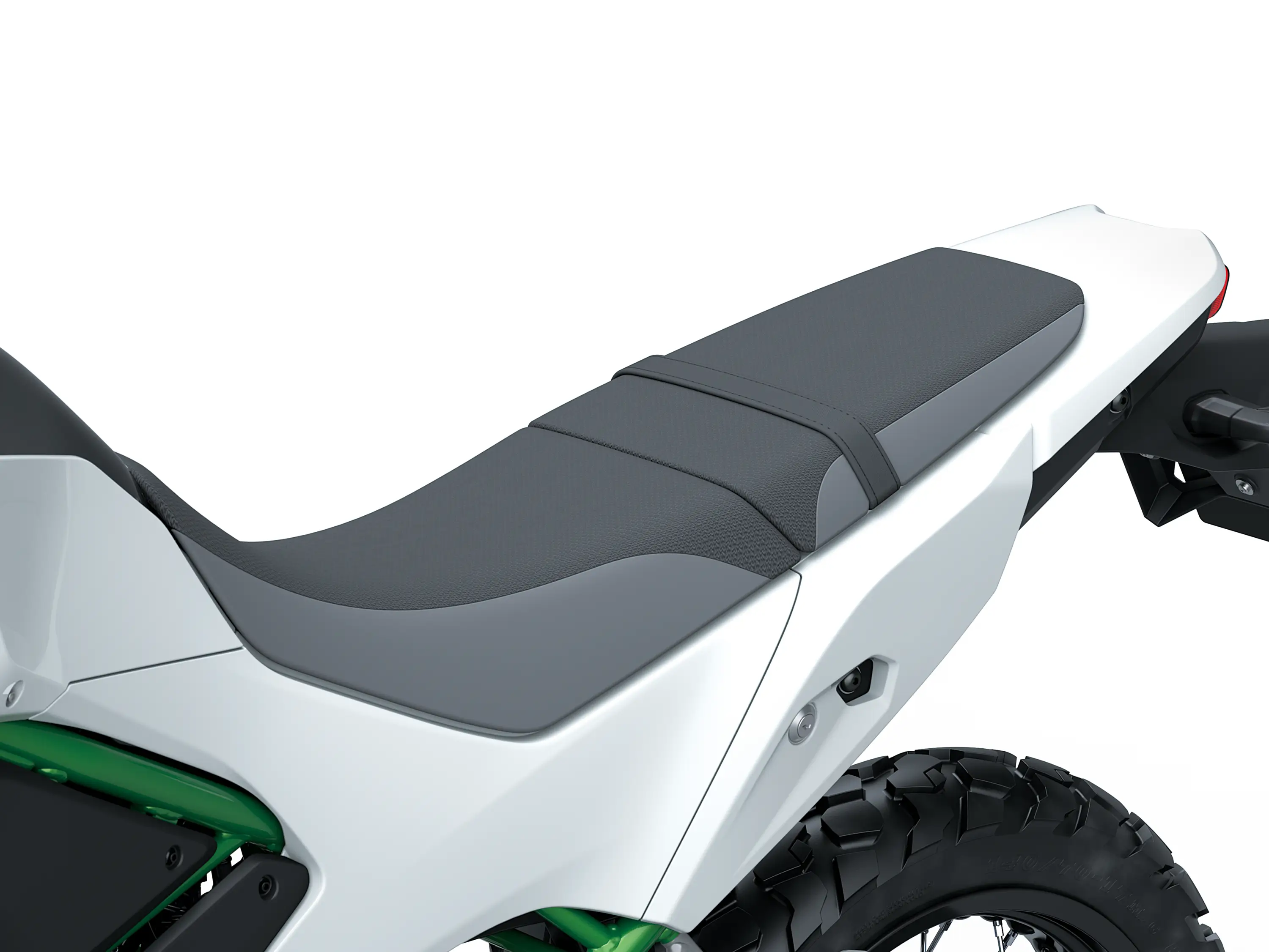 Another closeup on seat of a motorcycle staged in a white studio background.