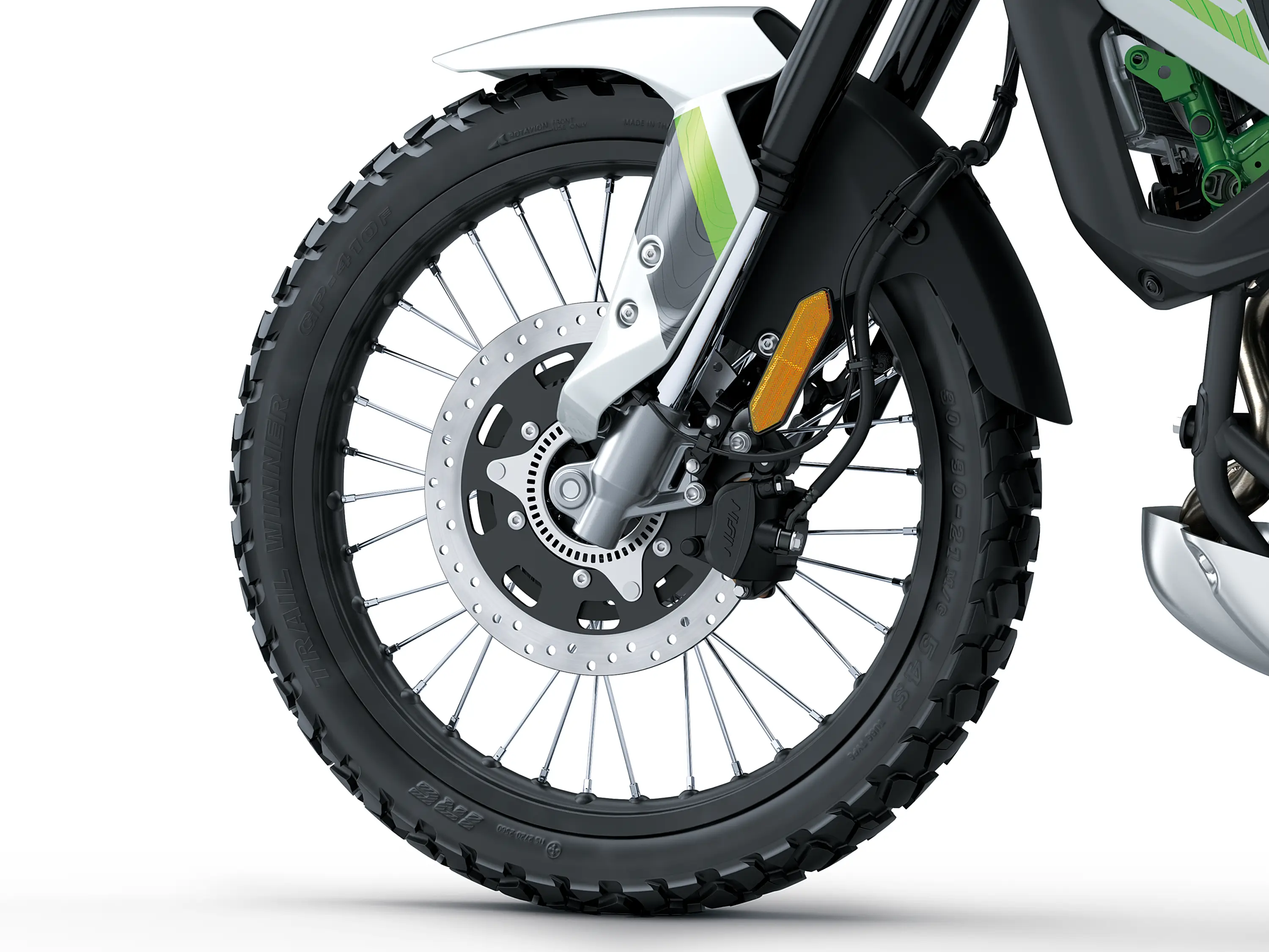 Closeup of a wheel of a motorcycle staged in a white studio background.