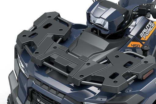 Close-up of the front cargo rack of an ATV staged in a white studio background. opens in a new window