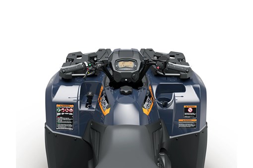 Driver POV of the handlebars of an ATV staged in a white studio background. opens in a new window