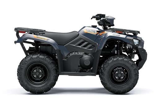 Profile angle of a blue ATV staged in a white studio background. opens in a new window