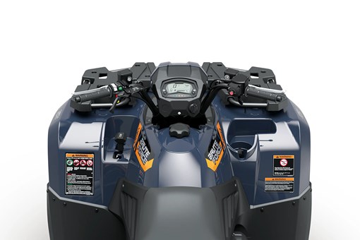 Driver POV of the handlebars of an ATV staged in a white studio background. opens in a new window