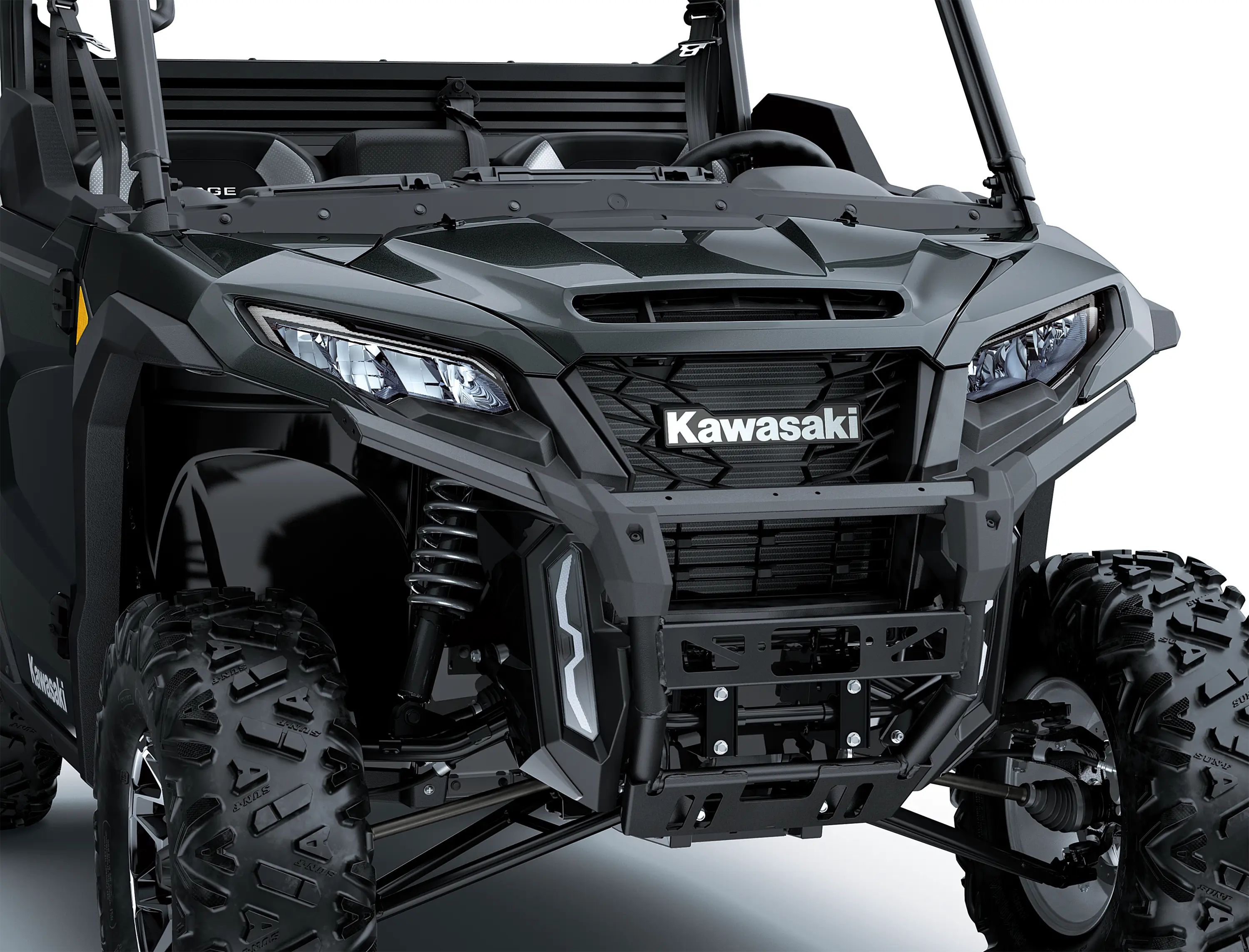 Close-up of the front end of a side x side in a white studio background.