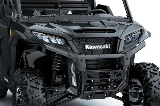 Close-up of the front end of a side x side in a white studio background. opens in a new window