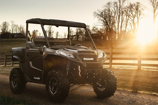 Three-quarter front angle of a side x side parked off-road. opens in a new window
